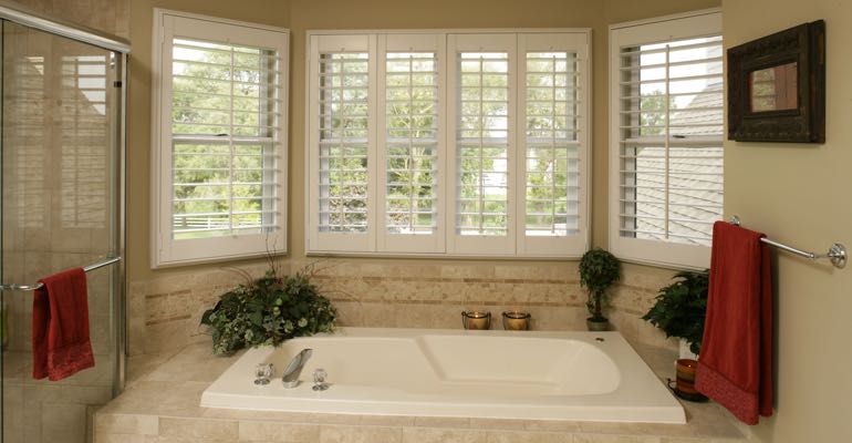 Plantation shutters in Salt Lake City bathroom.